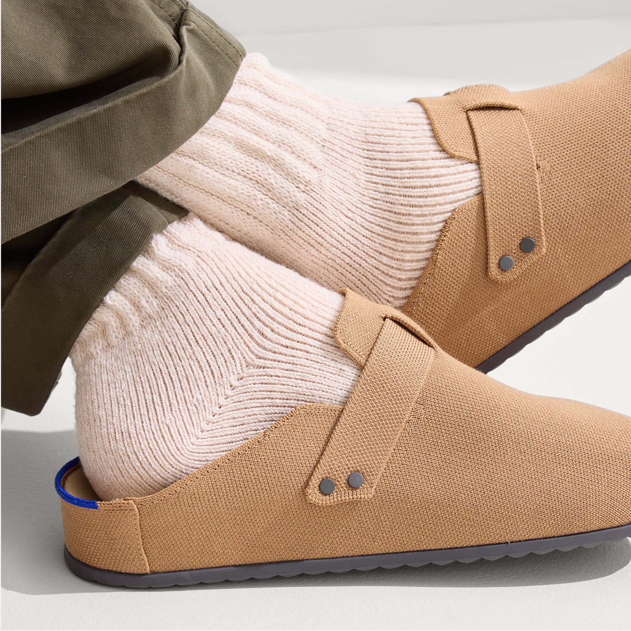 A model wearing The Men's Clog.